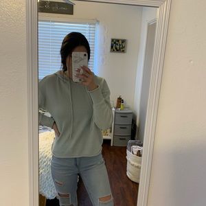 light blue/green hoodie